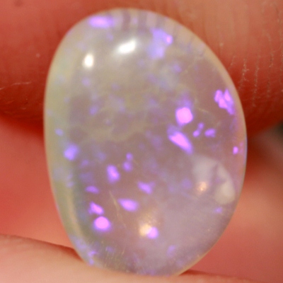 SOLID CRYSTAL OPAL Transparent with rich purple sparkles